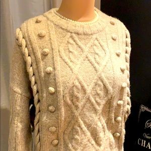 Neutral textured relaxed fit sweater.